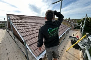 Juniper Roofing Southern Team inspecting roof
