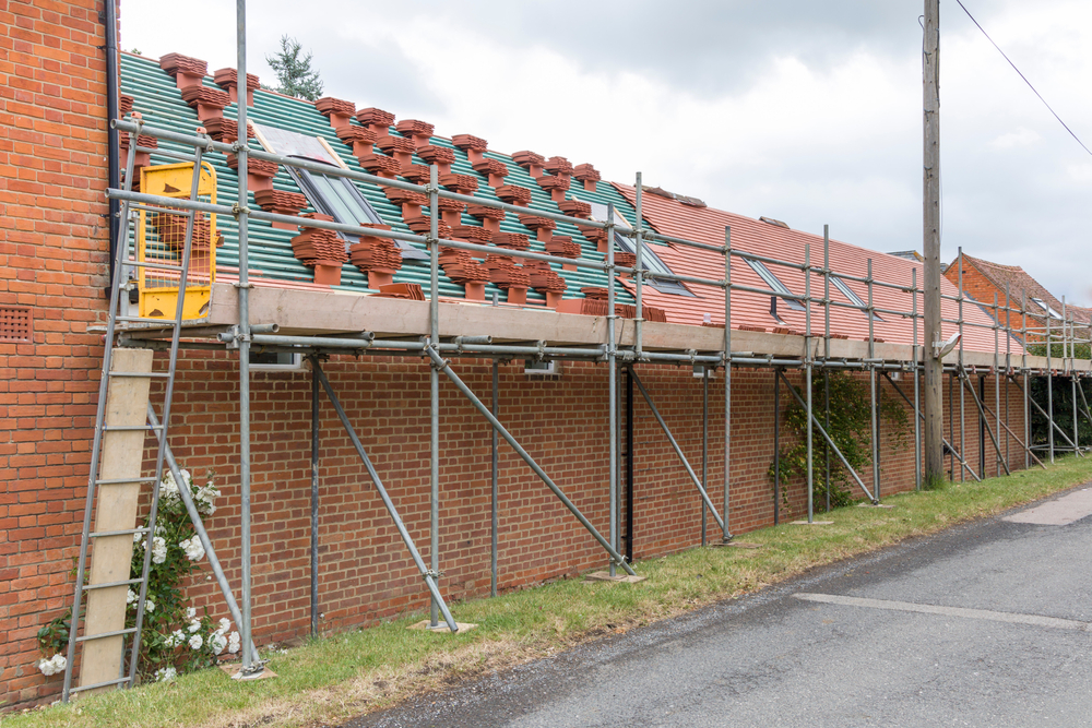 flat roof vs pitched roof, pitched roof being built
